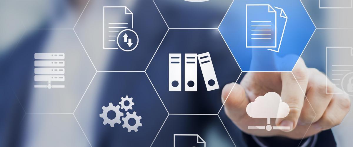 Document Management System (DMS) used to store, search and manage review process and users for corporate files and information in enterprise. Concept with business manager pointing to icons.